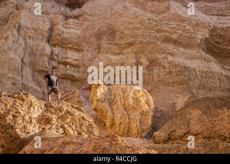 NAMIBE/ANGOLA - 03NOV2018 - Men on top of the canyons of the Namibe Desert. Africa. Angola. Stock Photo