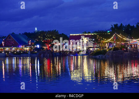 Orlando, Florida; November 15, 2018. Christmas market and colored lights reflected in the lake at night in International Drive area. Stock Photo