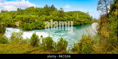 The powerful force of flowing and raging water of the Waikato River. Landscape at Huka Falls near Taupo, North Island, New Zealand. Stock Photo