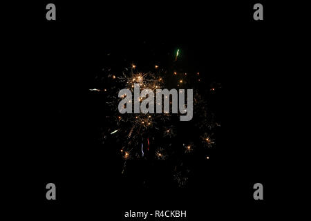 Exploding firework with a Black background. Stock Photo