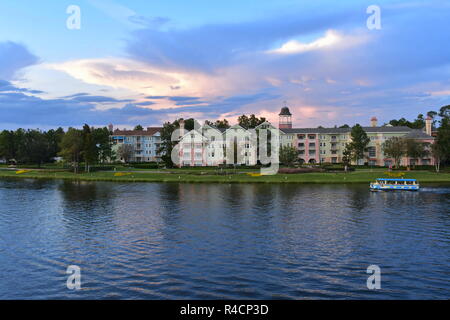 Orlando, Florida. November 18, 2018 Colorful Victorian style Hotel on beautiful cloudy sunset background at Lake Buena Vista Stock Photo