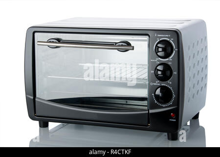 Cooking: Close up of Black Colored Oven Isolated on White Background Stock Photo