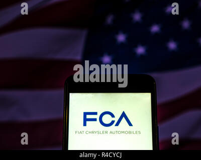 Fiat Chrysler Automobiles, Automobile company logo seen displayed on smart phone. Stock Photo