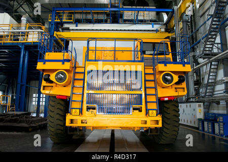 Big mining truck in the production shop of the car factory. Belaz is a Belarusian manufacturer of haulage and earthmoving equipment, dump trucks, haul Stock Photo