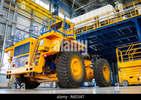 Big mining truck in the production shop of the car factory. Belaz is a Belarusian manufacturer of haulage and earthmoving equipment, dump trucks, haul Stock Photo