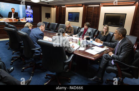 President Barack Obama participates in a secure video teleconference with foreign leaders to discuss Ukraine and global security issues, in the Situation Room of the White House, March 3, 2015. Participants include Prime Minister David Cameron of the United Kingdom, President Franois Hollande of France, Chancellor Angela Merkel of German, Prime Minister Matteo Renzi of Italy and European Council President Donald Tusk. (Official White House Photo by Pete Souza) Stock Photo