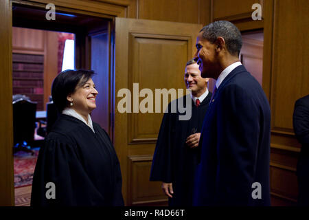 President Barack Obama talks with Justice Elena Kagan and Chief Justice John Roberts after Kagan's  Investiture Ceremony at the Supreme Court, Oct. 1, 2010. (Official White House Photo by Pete Souza) Stock Photo