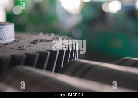 Metal lathe. Machining of metal by cutting on a turning and milling machine. Stock Photo