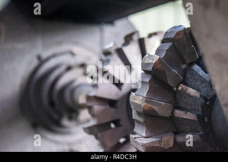 Machining of metal by cutting on a turning and milling machine. Industrial machine old design. Lathe equipment. Stock Photo