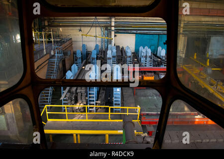Machine shop of metallurgical works indoors room. Shop blacksmithing plant. Industrial tourism. Manufacture of auto parts Stock Photo