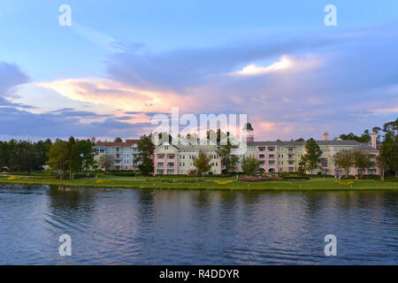 Orlando, Florida. November 15, 2018 Colorful Victorian style Hotel on beautiful cloudy sunset background at Lake Buena Vista Stock Photo