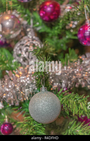 The silver ball for the background of the Christmas tree can see other blurred balls Stock Photo