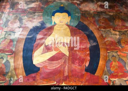 Colourful wall painting depicting Buddha, Chemrey Gompa in Ladakh, Jammu and Kashmir, India Stock Photo