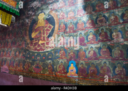 Colourful wall painting depicting Buddha, Chemrey Gompa in Ladakh, Jammu and Kashmir, India Stock Photo