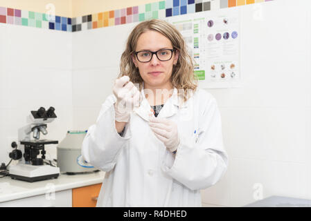 Young scientist working in a laboratory Stock Photo