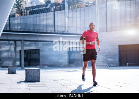 Handsome professional male athlete preparing for competition Stock Photo