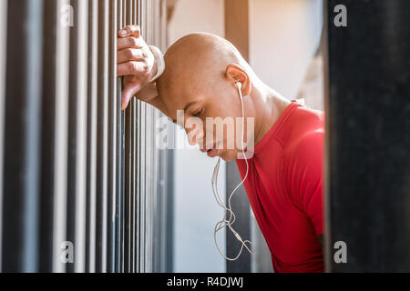 Nice afro American man feeling tired after training Stock Photo
