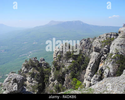 Beautiful mountain landscape with sheer cliffs. Distant