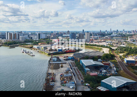 View of East London from the Emirates Cable Car crossing above the River Thames, London UK Stock Photo
