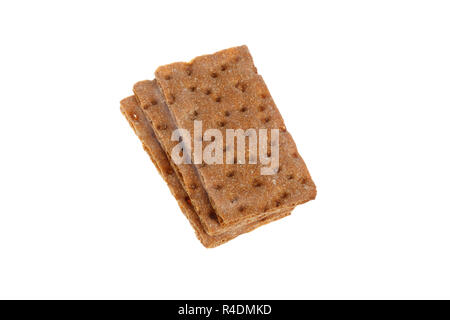 Three slices of crsip bread stacked isolated on white background. Stock Photo