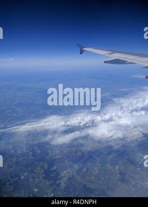 Airplane wing in the sky Stock Photo