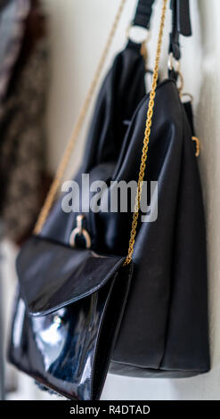 Purple School Backpack Hanging on the Wall - Isolated Object with White Background Stock Photo