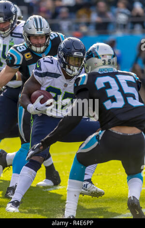 Carolina Panthers defensive tackle Daviyon Nixon (54) sings while sitting  on the bench during an NFL football game against the Denver Broncos,  Sunday, Nov. 27, 2022, in Charlotte, N.C. (AP Photo/Brian Westerholt