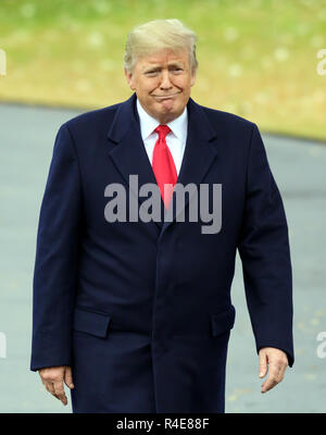 Washington, District of Columbia, USA. 26th Nov, 2018. United States President DONALD J. TRUMP answers questions as he departs the White House for campaign stops in Mississippi on Monday. Credit: Ron Sachs/CNP/ZUMA Wire/Alamy Live News Stock Photo