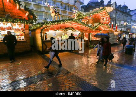 Birmingham, UK. 27th November, 2018. A late rainy afternoon makes the normally busy Birmingham German Christmas market a washout. Peter Lopeman/Alamy Live News Stock Photo