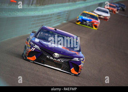 Homestead, Fla, USA. 18th Nov, 2018. Denny Hamlin, driver of the (11) FedEx Express Toyota, races during the Monster Energy NASCAR Cup Series Ford EcoBoost 400 Championship at the Homestead-Miami Speedway in Homestead, Fla. Mario Houben/CSM/Alamy Live News Stock Photo