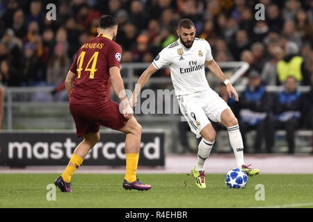 Rome, Italy. 27th November, 2018. Karim Benzema of Real Madrid is challenged by Konstantinos Manolas of AS Roma during the UEFA Champions League match between Roma and Real Madrid at Stadio Olimpico, Rome, Italy on 27 November 2018. Photo by Giuseppe Maffia. Credit: UK Sports Pics Ltd/Alamy Live News Stock Photo