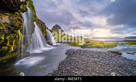 Cloudy Sunrise at Kirkjufellsfoss, Iceland Stock Photo