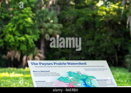 Gainesville, USA - April 27, 2018: Paynes Prairie Preserve State Park Watershed sign in Florida with information for tourists on trail hike Stock Photo