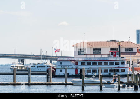 Fort Myers, USA - April 29, 2018: Bridges in marina harbor dock on Caloosahatchee River during sunny day in Florida gulf of mexico coast, park pier Stock Photo