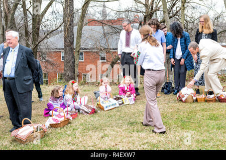 Washington DC, USA - April 1, 2018: People, children in traditional clothes, vyshyvanka outside with Easter baskets for blessing at Ukrainian Catholic Stock Photo