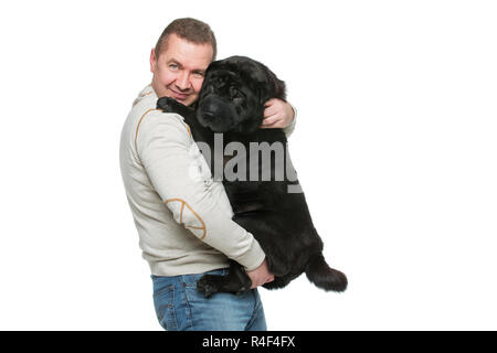 Man with sharpei dog Stock Photo