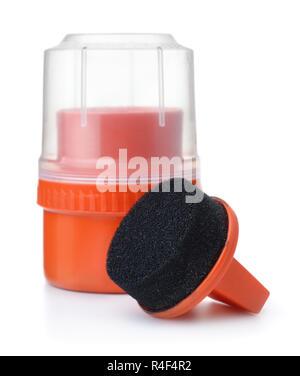 Shoe polish and shoes sponge isolated on white Stock Photo