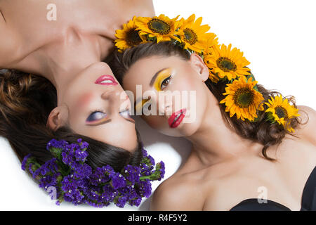 Two girls with flowers in hair Stock Photo