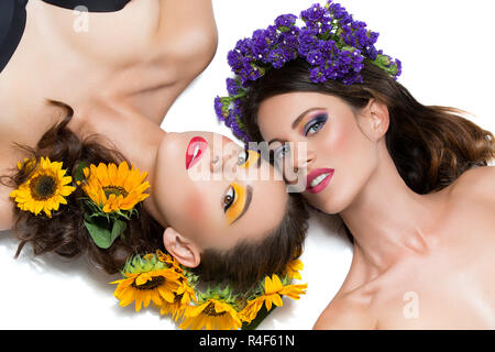 Two girls with flowers in hair Stock Photo