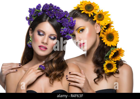 Two girls with flowers in hair Stock Photo