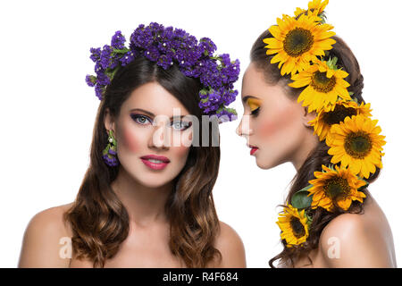 Two girls with flowers in hair Stock Photo