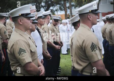 FORT LAUDERDALE, Fla. -- Marines with 3rd Battalion, 2nd Marine Regiment stand in formation before taking part in a 'roll call' during the Fleet Week Port Everglades opening ceremony in Fort Lauderdale, Fl., May 1, 2017. The Marines were welcomed by Fort Lauderdale city mayor, Jack Seiler, and throughout the week will take part in many different community relations events. Stock Photo