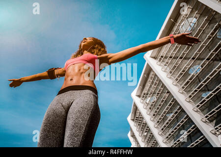 Low angle of a beautiful fit woman Stock Photo