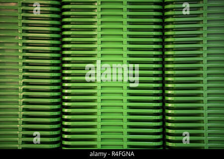 folded green plastic containers at store Stock Photo
