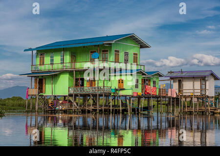 INLE LAKE, MYANMAR - DECEMBER 09, 2016 : floating houses on the canal of the Inle Lake Shan state in Myanmar (Burma) Stock Photo