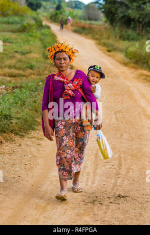 KALAW, MYANMAR - DECEMBER 07, 2016 : Shan tribe woman walking in tradional costume near Kalaw in Myanmar (Burma) Stock Photo