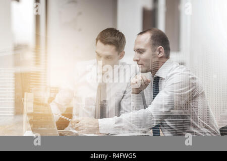 two businessmen having discussion in office Stock Photo