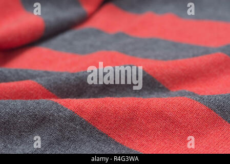 folded striped red and gray textile background texture Stock Photo