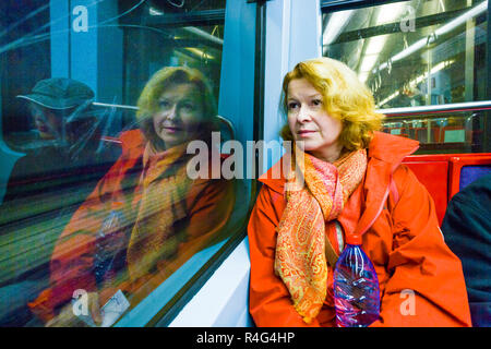 woman in subway Stock Photo