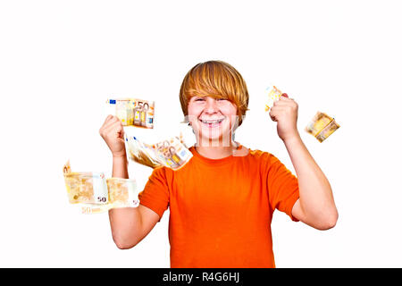 Euros flying around a boys head Stock Photo